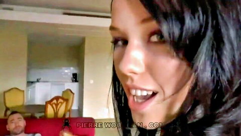 Megan Rain smiling excitedly in steamy double penetration scene