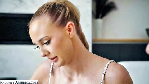 Paisley Porter in seductive white dress, blonde ponytail close-up