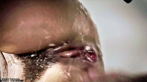 Close-up of wet, dripping pussy with cum and pubic hair