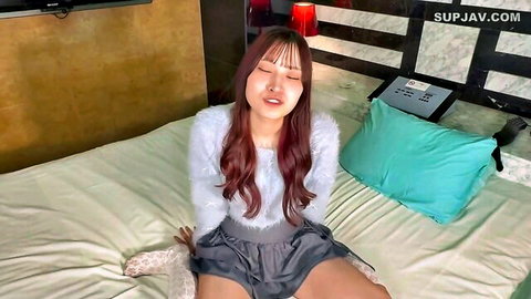 19yo Asian Miao-chan in fluffy sweater and skirt on bed, JAV solo