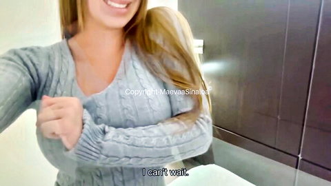 Maevaa Sinaloa blonde model teasing in gray sweater selfie