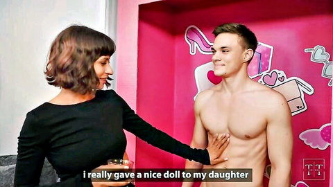 Lustful MILF seducing young toyboy with hand on his abs