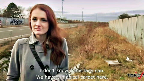 Thin redhead Jessica in gray coat outdoors, amateur EroCom scene