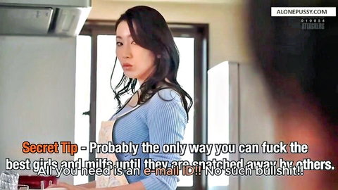 Asian MILF in blue dress and apron teases in kitchen, mother-in-law fantasy
