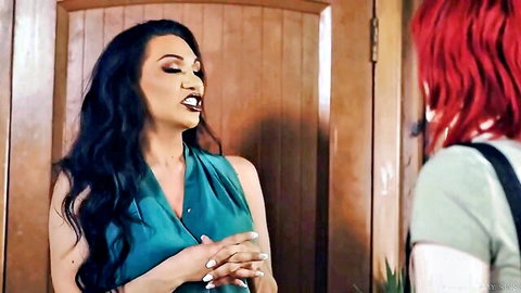 Ella Hollywood in teal dress chatting with redhead in upcoming threesome scene