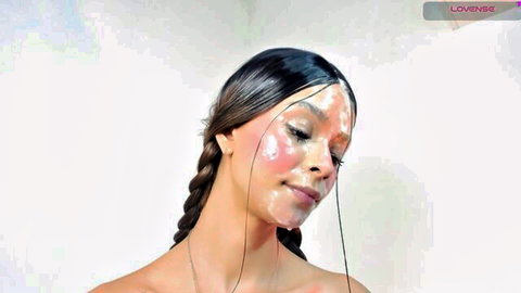 Mariaa with sloppy facial cumshot, white streaks on her flushed face and braids