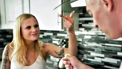 Tattooed blonde stepsis surprised by finger in pussy, smiling in intimate moment