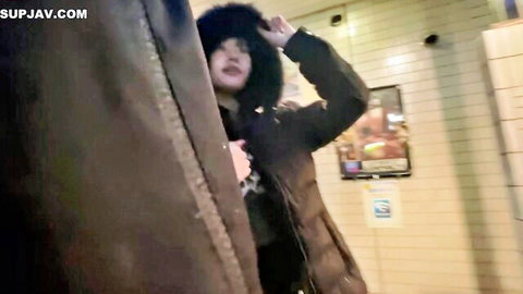 22yo Japanese D-cup college girl in fur hood jacket, smiling playfully in locker area