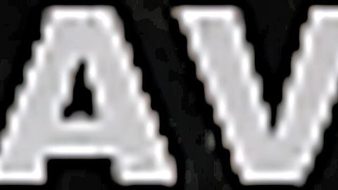 Pixelated AV text on black background for African-themed adult video