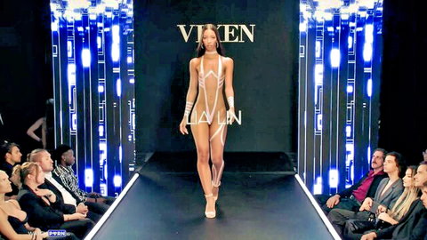 Ebony model struts runway in sheer white lingerie barely covering small tits and pussy