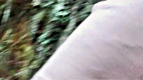 Blurry outdoor voyeur scene with Emma Anturin and partner