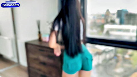 Melanie Queen in tight green shorts, big ass tease by window