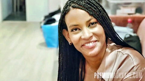 Samantha Cruuz smiling with long braids in Premium Bukkake preview