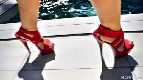 Savannah Bond's toned legs in red stiletto heels by pool, big titties threesome tease