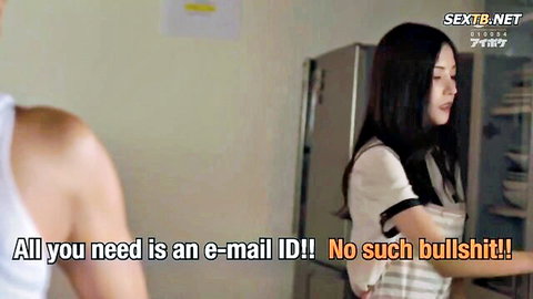 Kaede in casual white top by fridge in kitchen JAV scene