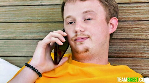 Freckled redhead guy on phone in yellow shirt, Tomboyz with Miss Raquel & Marina Vaylor