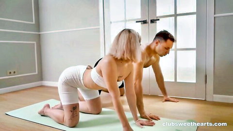 Molly Cute in tight white yoga pants on all fours with muscular partner