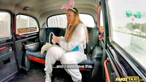 Liza Billberry as Easter Bunny in Fake Taxi, blonde in white bunny onesie teasing ride