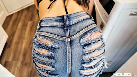 Penelope Woods bends over in ripped jeans exposing big ass on laundry day