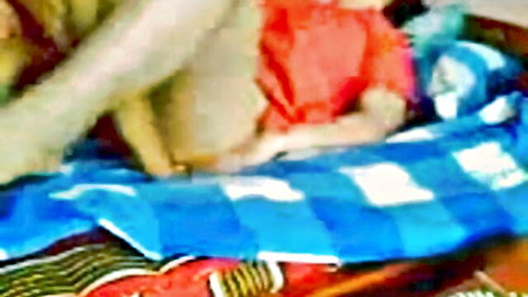 Busty Bangladeshi girl in orange top fucked hard by man on bed