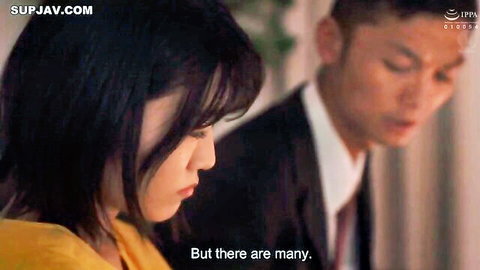 Japanese beauty in yellow top gazing seductively at suited Asian man in closeup JAV scene