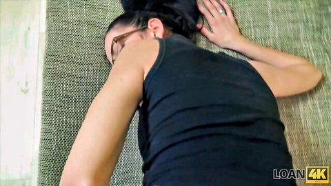 Brunette teen secretary in black tank top posing prone on casting