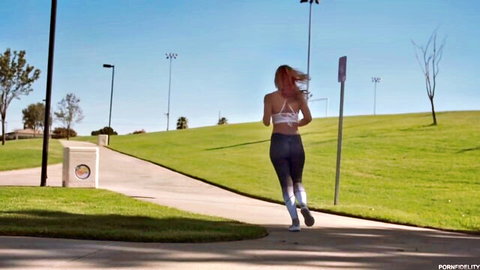 Demi Lopez jogging outdoors in white sports bra and black leggings
