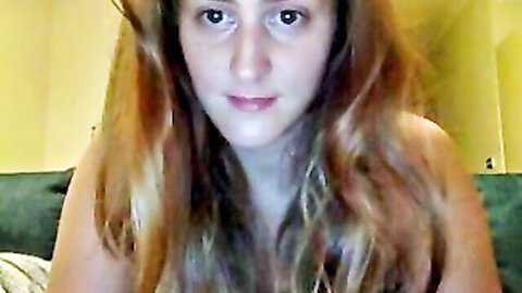 Light-haired cam beauty teasing and playing with her perky titties