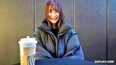 Smiling Japanese amateur in coat holding Starbucks coffee, first-time JAV face reveal