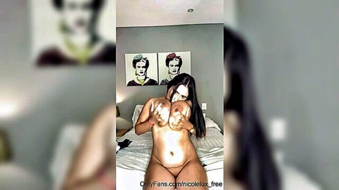 Curvy Latina with big tits posing nude on bed, OnlyFans style