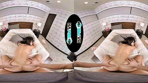 Asian woman with large breasts in nude VR spread-legs pose