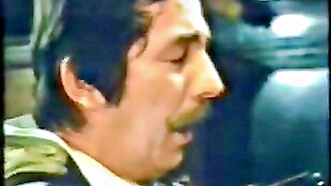 Vintage close-up of mustached man in suit from Josefine Mutzenbacher 2 classic XXX