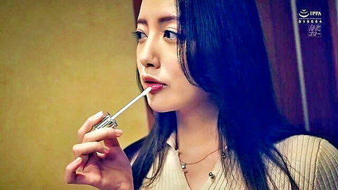 Kanna Misaki applying red lipstick seductively in close-up JAV thumbnail