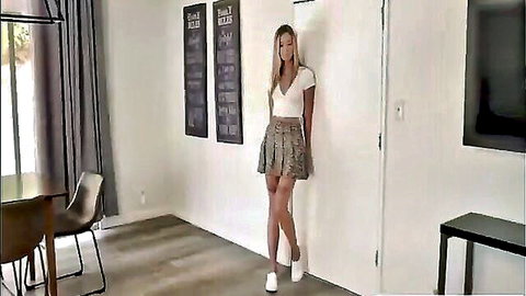 Blonde stepsister in white crop top and grey mini skirt teases seductively