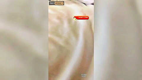Blurry thumbnail of Indonesian woman lying nude in live interracial show