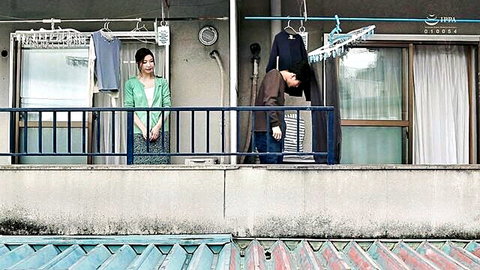 Japanese wife on balcony with bending neighbor in sweaty JAV encounter
