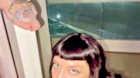 Stunning Marilyn seductive gaze with bangs and tattooed hand in POV