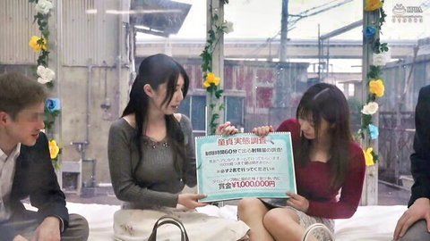 Two Japanese women in elegant dresses receiving award on stage with man
