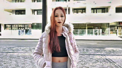 Hot Czech gypsy redhead in pink puffer jacket teasing midriff outdoors