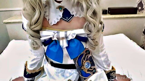 Silver-haired cosplay babe in sexy blue-white uniform sits on bed showing back and curves