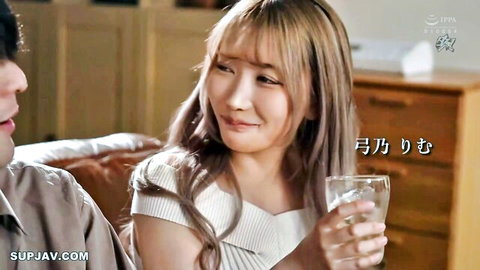 Rimu Yumino in off-shoulder white dress, smiling with male partner
