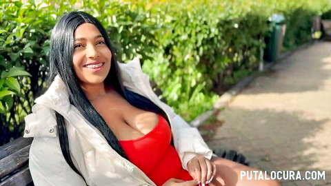 Colombian BBW babe smiling with big cleavage in red swimsuit on street