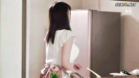 Mei Washio in white blouse and pink apron, teasing pose in JAV scene