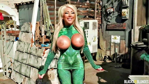 Blonde Kitana Montana in tight green bodysuit, huge tits bulging
