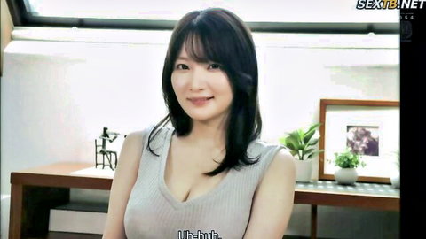 Mei Washio in tight gray tank top showing deep cleavage, smiling in JAV cheating wife scene