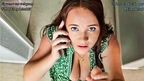 Annabelle Rogers kneels in green dress, helping with zipper on phone call