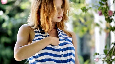 Red Fox redhead teen in striped shirt showing cleavage