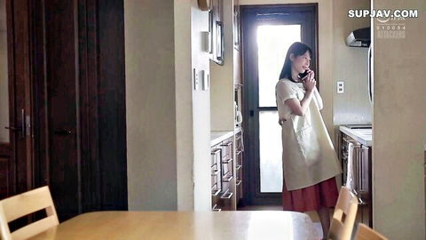 Japanese housewife in apron and red skirt on phone, teasing wet reunion