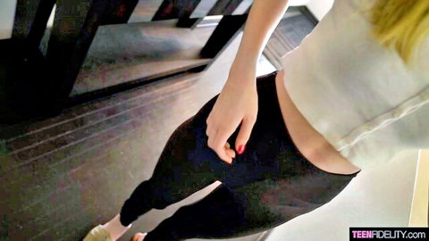 Skinny blonde teen tugs black leggings down teasing small ass and midriff in white crop top