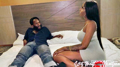 Tender Montana ebony MILF in tight gray dress on bed with man